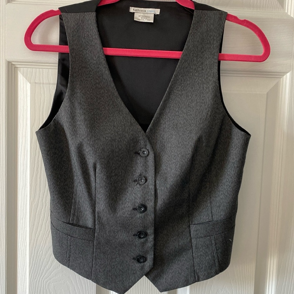 Black, button down vest.